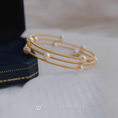 China CLASSIC Pure 14k Gold Spring Women's Jewelry Anniversary Wedding Engagement 14k Yellow Gold Pearl Bangle Custom Made Bracelet for sale