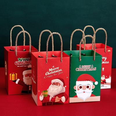 China Recyclable Paper Bags Christmas Gift Bags Craft Retail Paper Bag With Logo for sale