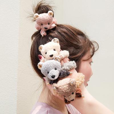 China Autumn and winter new bear fashionable main headdress of an elastic hair band hair rope plush ball head girl rope super cute central institute of statistics cute main ball doll for sale