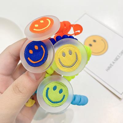 China Wholesale Sweet Color Korean Simple Phone Line Candy Smiley Hair Tie Cute Girls Hair Accessories Elastic Headband for sale