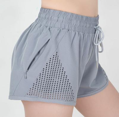 China Breathable Lazer Cut Running Shorts Women 2 In 1 Training Shorts Double Bottom Seated Workout With Pocket for sale