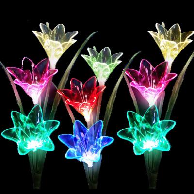 China Solar Powered Garden Path Light Outdoor Solar Powered Stake Lights Solar Powered Lights with 12 Lily Flower Multi-Color Changing LED Solar Landscape Lighting for sale