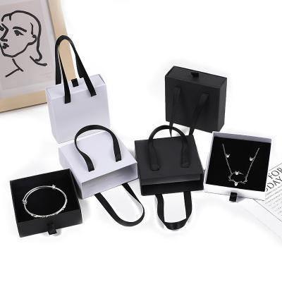 China Elelgent Wholesale Jewelry Packaging Drawer Box Necklace Bracelet Black Cardboard Paper Jewelry Box With Handle for sale