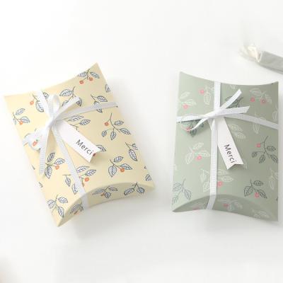 China Small Fresh Floral White Creative Candy Spot Elelgent Cardboard Scarf Packaging Box Paper Folding Pillow Tissue Paper Box for sale