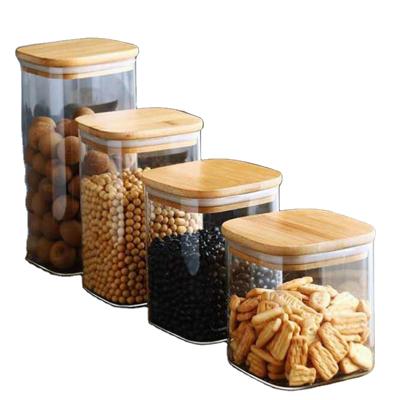 China Wholesale Viable Square Glass Coffee Bean Storage Jar Home Candy Sealed Storage Jar Kitchen Storage Jar With Wooden Lid for sale