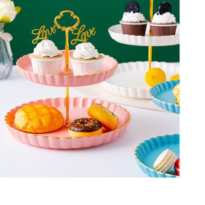 China Viable Wholesale Gold Rim Glazing Ceramic Cupcake Stand Holder Cupcake Cake Stand For Gift for sale