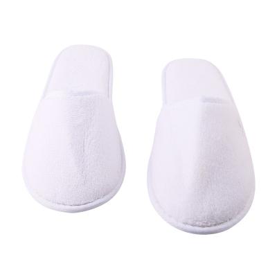 China Exquisite Eco-friendly Disposable Hotel Amenities Customized Embroidered Disposable Hotel Coral Fleece Logo Fleece SPA Slippers for sale