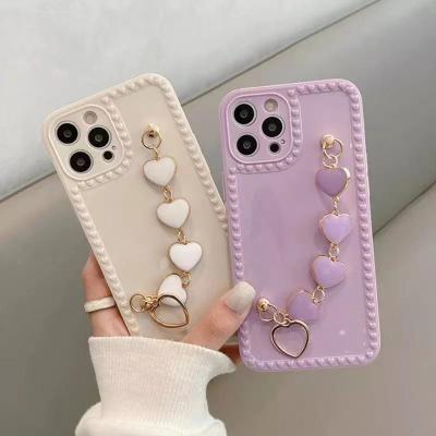 China Shiny Heart View Anti-fall Love Candy Wrsit Chain Phone Case For Iphone Samsung Hand Strap Phone Case for sale