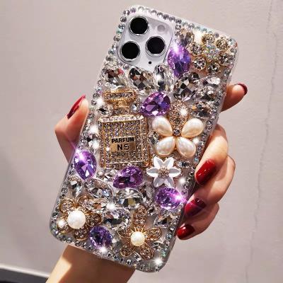 China Anti-fall For Iphone 13 Creative Bling Diamond Anti-fall Phone Case Ladies Perfume Bottle Phone Case for sale