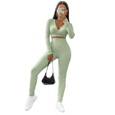 China Clothing 2021 Autumn New Fashion Wholesale QUICK DRY Sexy Women's V-Neck Navel Street Sports Two-piece Female Long Sleeve Solid T-shirt Suit for sale