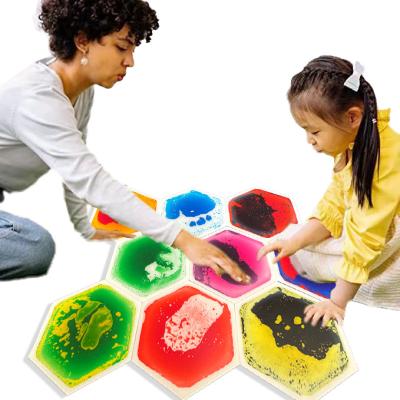 China Eco-Friendly PVC Vinyl Flooring Montessori Tiles Educational Toys Hexagon Liquid Sensory Kids Playground Flooring For Kids Toys for sale