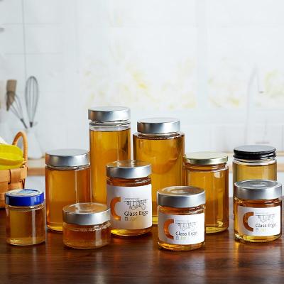 China FOOD GRADE Round Glass Jars 314ml 375ml 580ml 750ml Empty Clear Honey Jar Straight Side Jar Glass Jars For Honey for sale