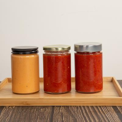 China FOOD GRADE Round Airtight Straight Side Wholesale Glass Ergo Jar Sauce Jar With Lid for sale