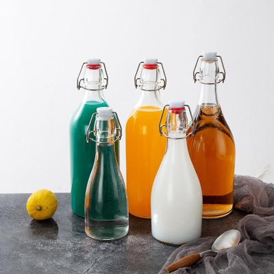 China Wholesale Beverage Style 1000ml Glass Swing Top Bottle New Flip Top Bottle for sale