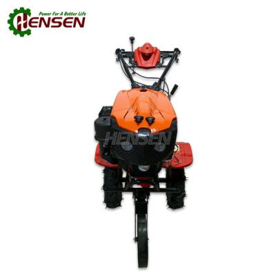 China Orange Small Gas Powered Garden Tiller 300mm Deep Power Tiller In Agriculture for sale