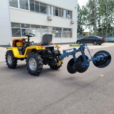 China 12HP To 18HP Farm Small Tractor Four Wheel Drive Mini Tractor With Disc Plow for sale