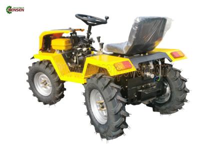 China Full Time Four Wheel Mini Tractor With Grass Shredder Yellow for sale