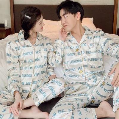 China QUICK DRY Autumn Printed Ice Silk Long Sleeve Pajamas 2 Piece Men And Women Couples Pajamas Sets for sale