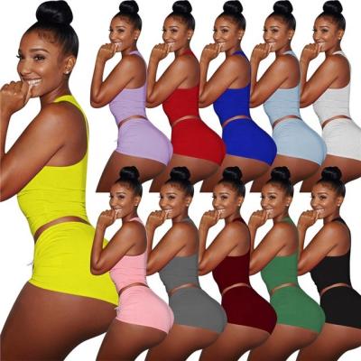 China Breathable Colorful Bright Women Clothes Gym Suit Sports Bra Tops Yoga Shorts Set Two Piece Outfits Crop Top And Mini Skirt Set for sale