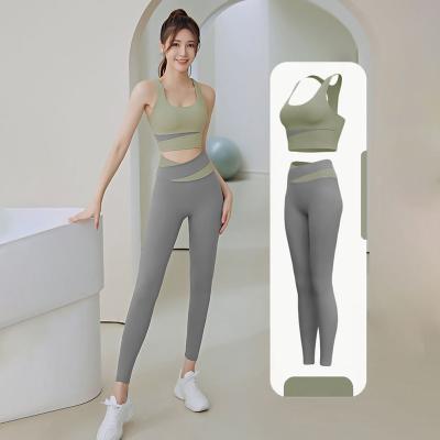 China New Color Contrast Tops Tight Fit Naked Female Yoga Suit Breathable Abdominal Fitness Clothing for sale