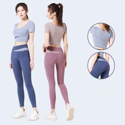 China Breathable Europe And USA New Fitness Suits Solid Color Polyester Womens Yoga Suits for sale