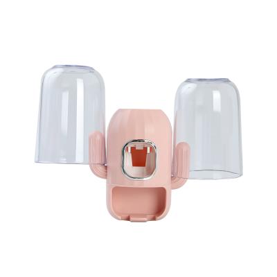 China Sustainable Wholesale Household Bathroom Automatic Sactus Shape Wall Mount Toothpaste Squeezer for sale