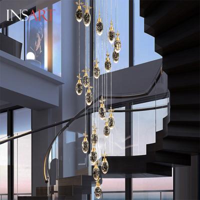 China Modern Decorative Luxury Water Drop Long Pendant Light Led High Ceilings Crystal Staircase Chandeliers for sale