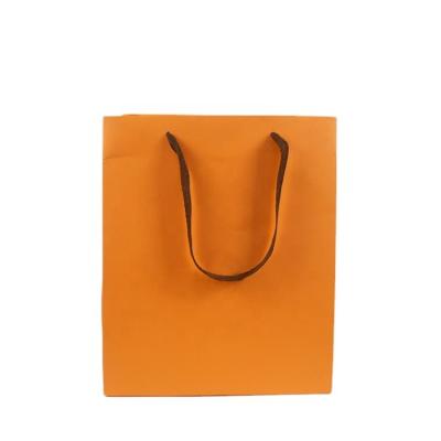 China Factory Wholesale Custom Paper Bag Recyclable With Ribbon Handle Matte Lamination Paper Bag Design Printing for sale