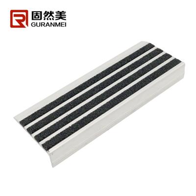 China Black Aluminum Stair Edge Protection Carborundum Stair Nosing Strips for sale