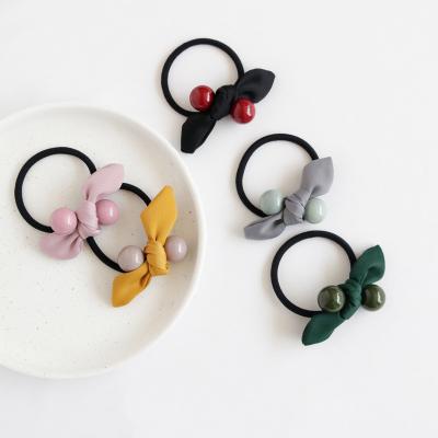 China Fashion& Elegant Bowknot Pearl Hair Rope Ties Hair Band Women Ponytail Handmade Elastic Ponytail Holder for sale