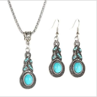 China New Hot Selling Trendy Retro Fashion Pattern Blue Crystal Inlaid Turquoise Personality Necklace Bohemian Earring Set For Women for sale