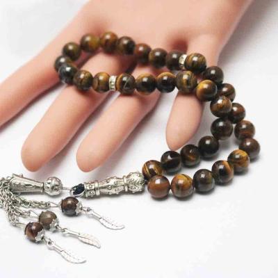 China Handmade Unisex Tiger Eye Stone Rosary Alloy Tassel Radiation Bracelet Bangle 33 Muslim Tesbiha for sale