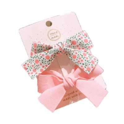 China Popular cool floral INS bow hairpin kids lean bill clip set cute strokes cut side clip hairpin for sale