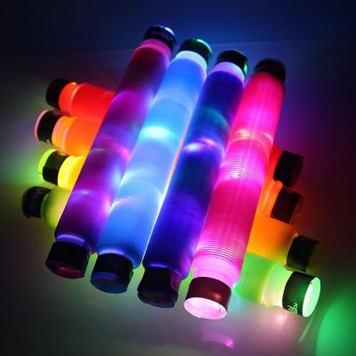 China Party Decoration / Toy For Kids Toys Supplier Busy Person Toys Glow In The Dark Light Pop Tubes Gifts Squeeze Tubes Relaxing Toys for sale