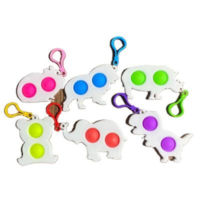 China Educational Noise Toys Other Wholesale Kids Educational Toys Fidget Plastic Dimple Fidget Sensory Toys Decompression Key Chain Silicone for sale