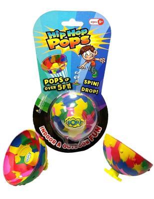 China Game Novelty Wiggle Toy Half Ball Rubber Jumper Hip Hop Up Toy Pop Jumping Ball for sale