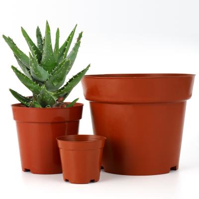 China Hot Selling Amazon Minimalist Garden Nursery Maker Base Plant Pots Creative Net Bottom Small Red Plastic Flower Pot for sale