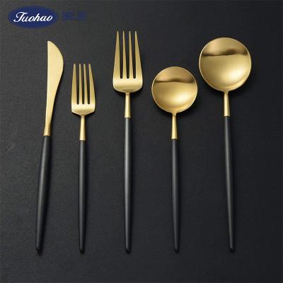 China Portugal Viable Western Style Black Gold Cutlery 5 Pieces Knife Fork Serving Long Handle Flatware Spoon Set for sale