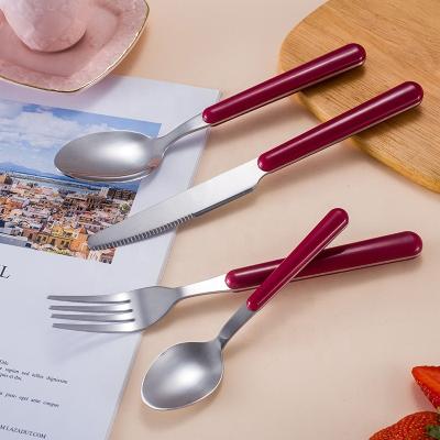 China Viable Wholesale Polish Stainless Steel 4pcs Spoons and ABS Handle Cutlery Set Stylish Plastic Mirror Silverware Knife Forks for sale