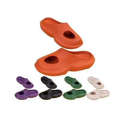 China Fashion trend wholesale EVA slide shoes women and men solid color toe cavity slide sandal slipper open house for sale