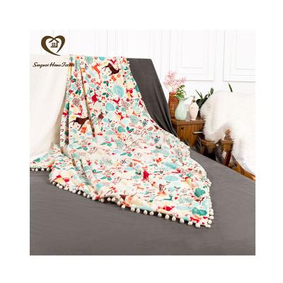 China Shaoxing Songmai PORTABLE Double Sided Flannel Blanket With Ball Customized Logo Pattern For Christmas for sale