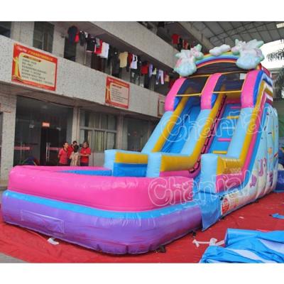 China 1000D 0.55mm PVC Tarpaulin Hot Selling Popular Theme Flying Unicorn Wet Slide Kids Inflatable Commercial Water Slides for sale