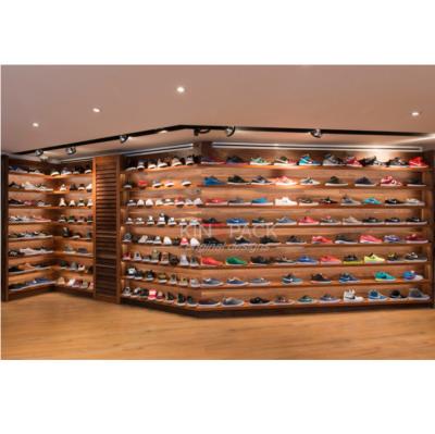 China Unique Wooden Shoe Store Decorating Ideas Shoe Store Decoration Ideas With LED Display Racks Lighting Shoe Shopfitting for sale