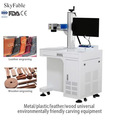 China Automatic Fiber Laser Marking Machine Metal Plastic Leather Wood Engraving Equipment for sale