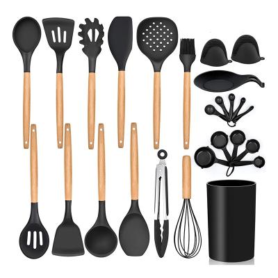 China Sustainable Hot Selling 26 Pieces Wooden Handle Silicone Cookware Cookware Set With Plastic Holder for sale