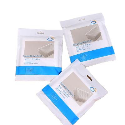 China Sustainable Business Disposable Pure Cotton Travel Towels Nonwoven Bathing Towel for sale