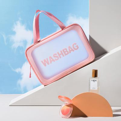 China Custom Waterproof Makeup Logo Print Clear Fashion Pvc Tote Zipper Bag for sale