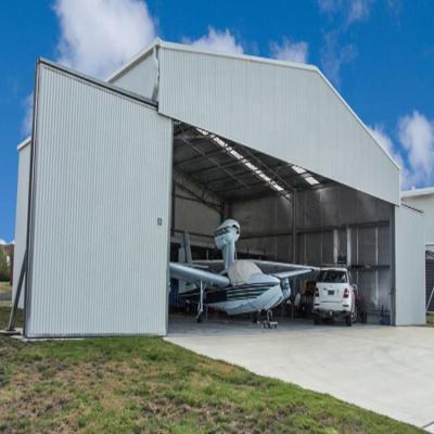 China Steel Fabricated House Prefab Steel Structure Storage Building Aircraft Hangar en venta