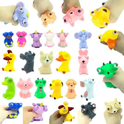 China 2022 PVC New Arrivals Novelty OEM Squeeze Capsule Toys Dinosaur Series Animal Eyes Jumping Toy for sale