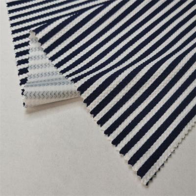 China Tear-Resistant Navy Regular Line Printing On White Ant Fleece Polyester Fabric Printing Knitting Fabric for sale